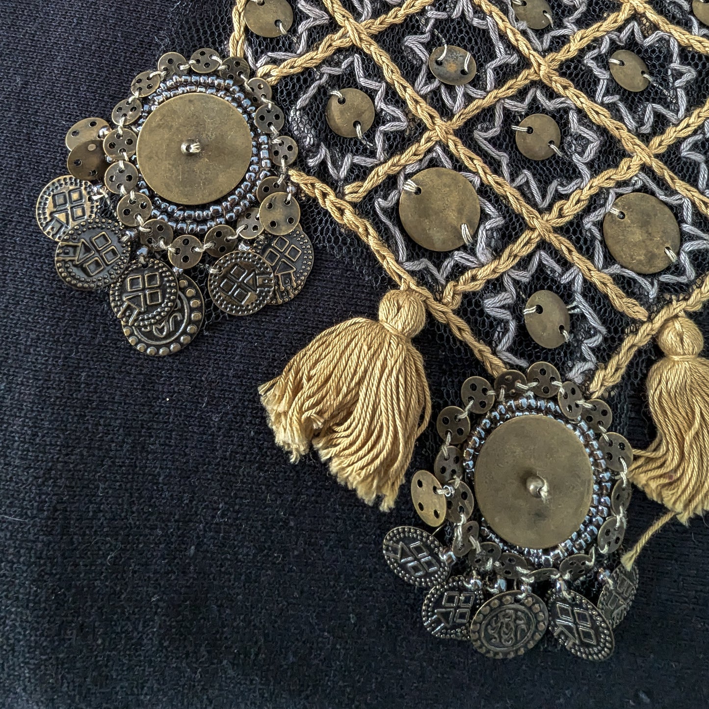 Antique gold metal ornament with tassels on black tulle, 20x50cm, for tunics.