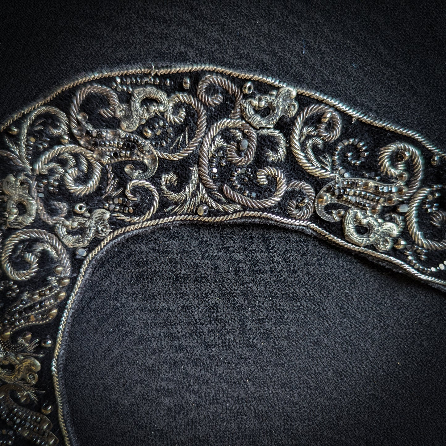 D&G black mixed fabric horseshoe patch, 15x20cm, with intricate silver embroidery and beads.