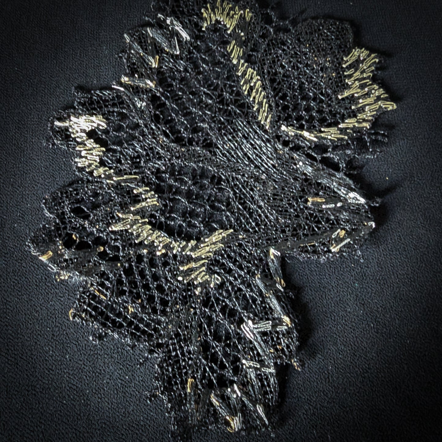 Black D&G lace flower patch with gold bead accents, 10x13 cm.