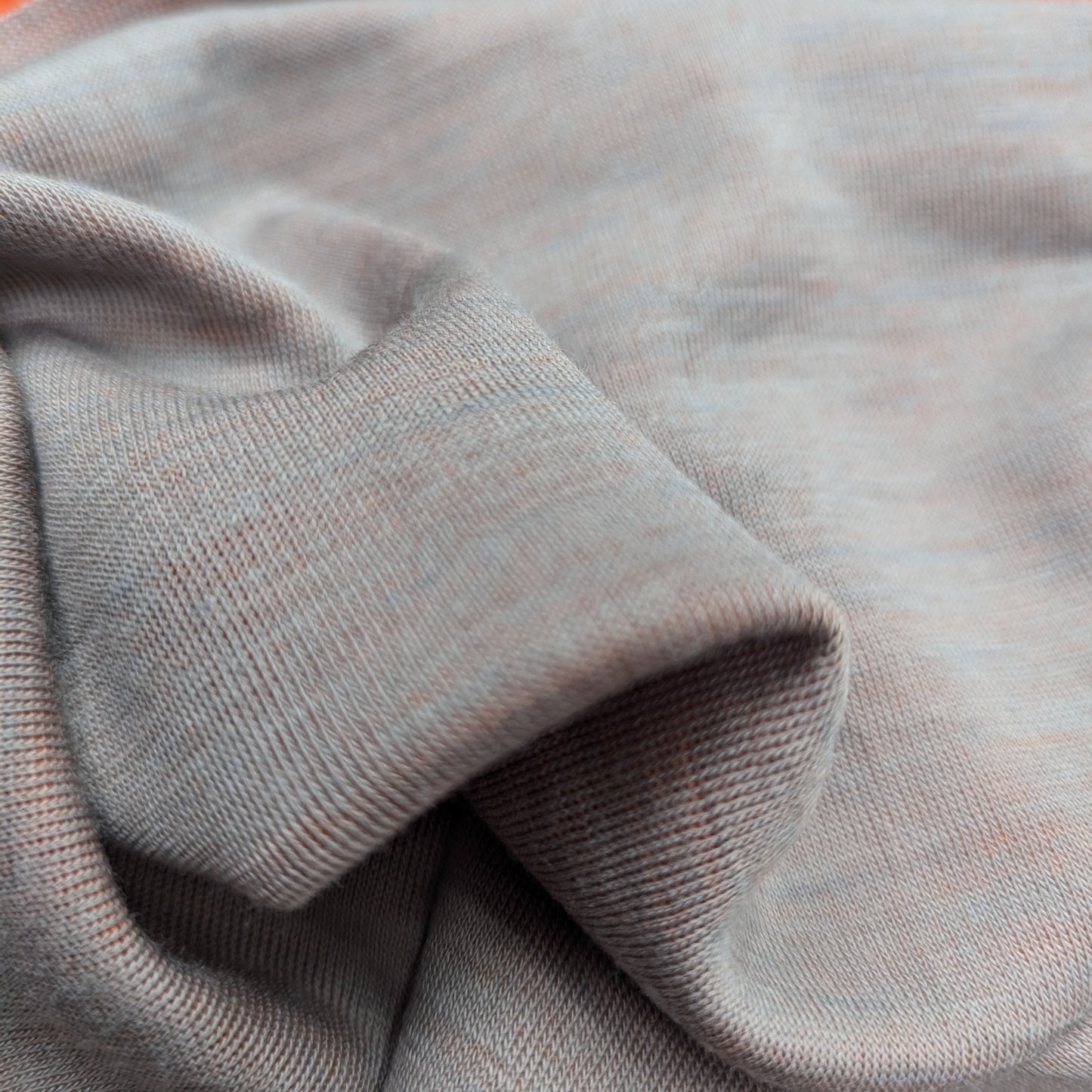 Orange doubleface wool cashmere jersey fabric, 100x75cm, with soft drape.
