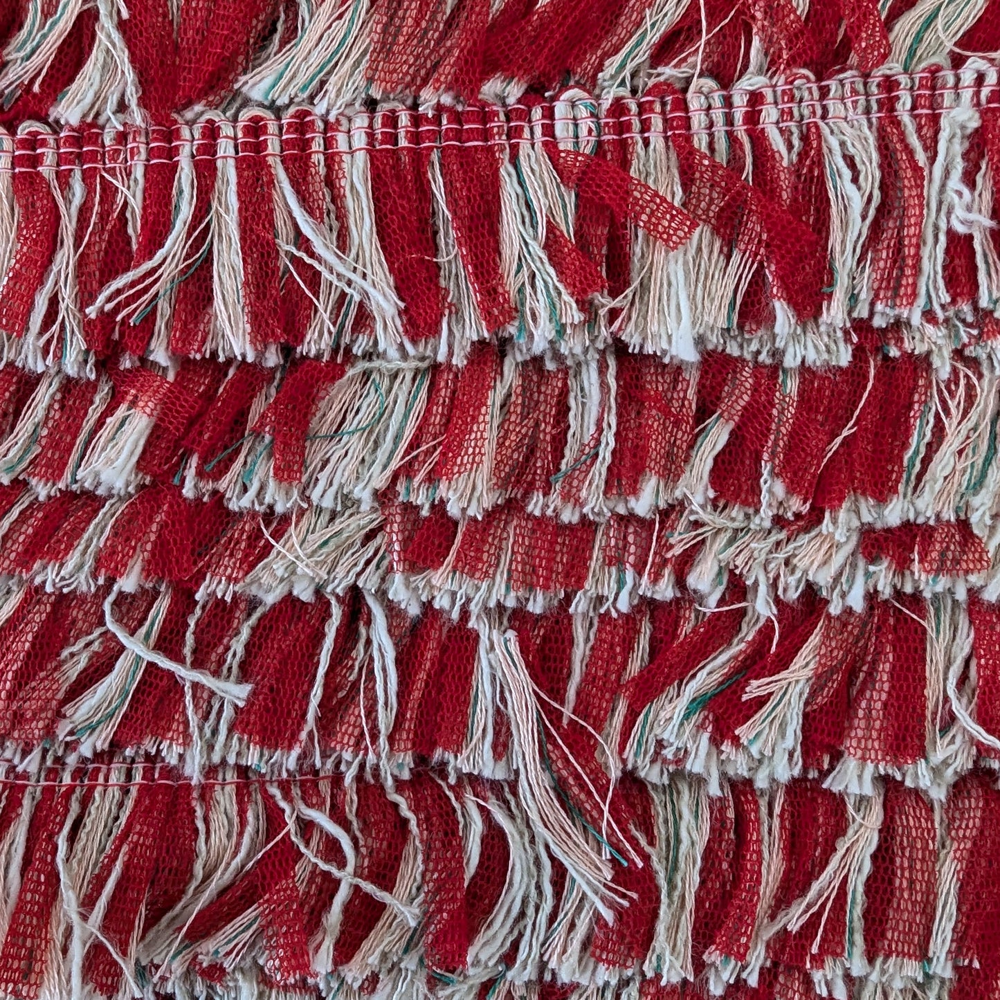 Red and cream textured tweed fringe trim, 100 cm, with subtle green threads.