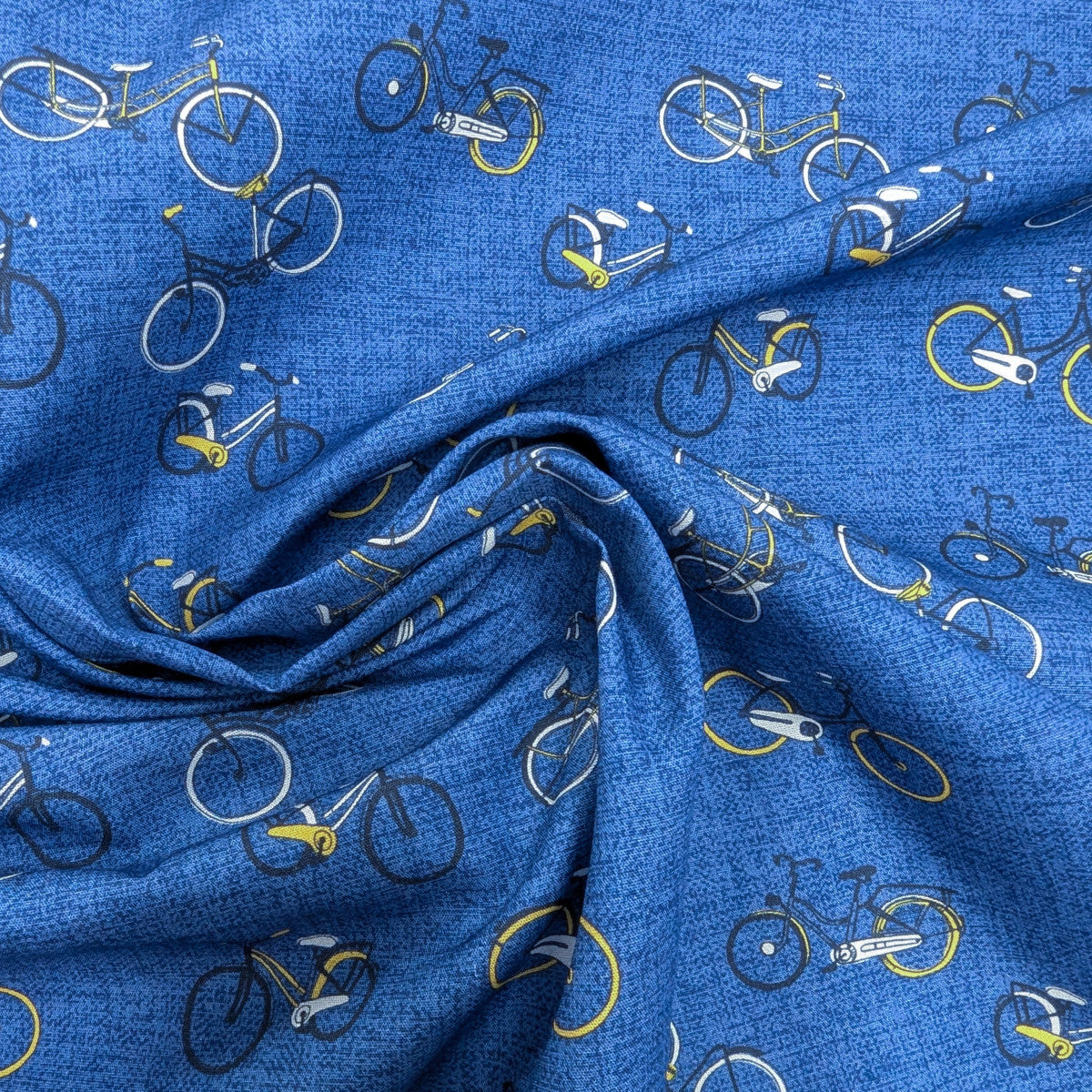 Blue cotton poplin deadstock fabric with white and yellow bicycle pattern, 160x140 cm.