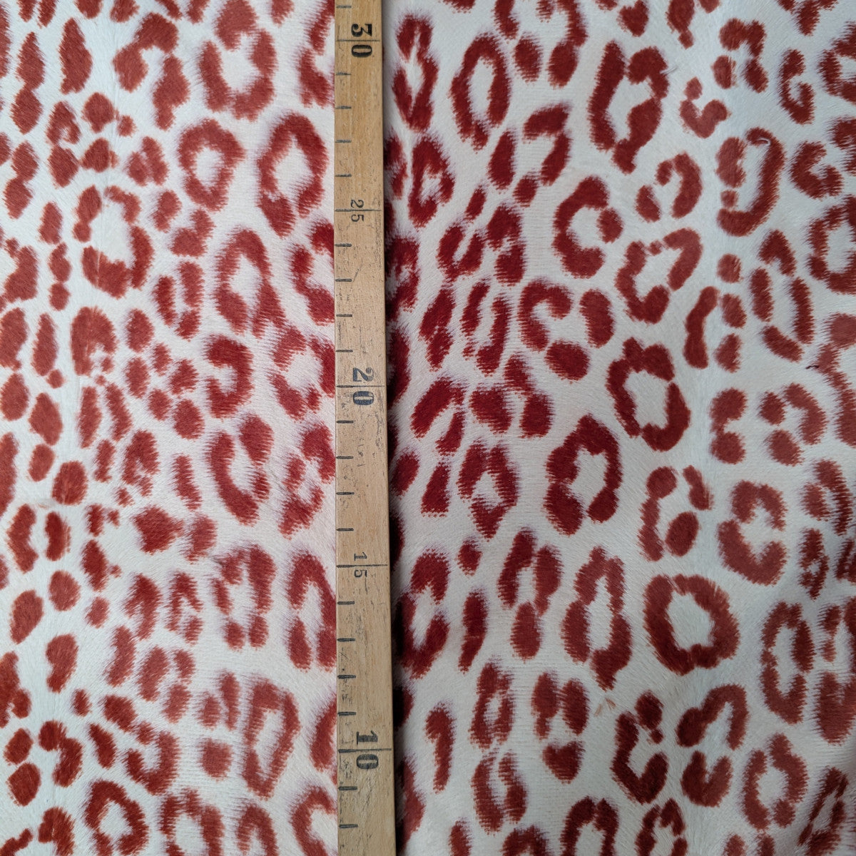 Mantelstoff · Baumwolle/Polyester · Leopardenmuster · Farbe: Naturweiß- und Orangetöne · 130 cm · 280 g/m² · Meterware