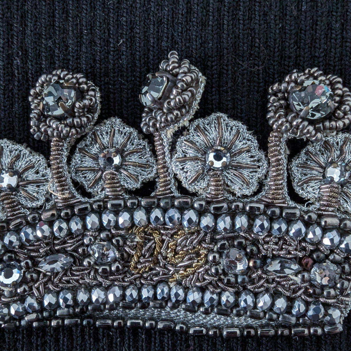 D&G black patch with intricate silver and gold crown embroidery, beads, and clear jewels.