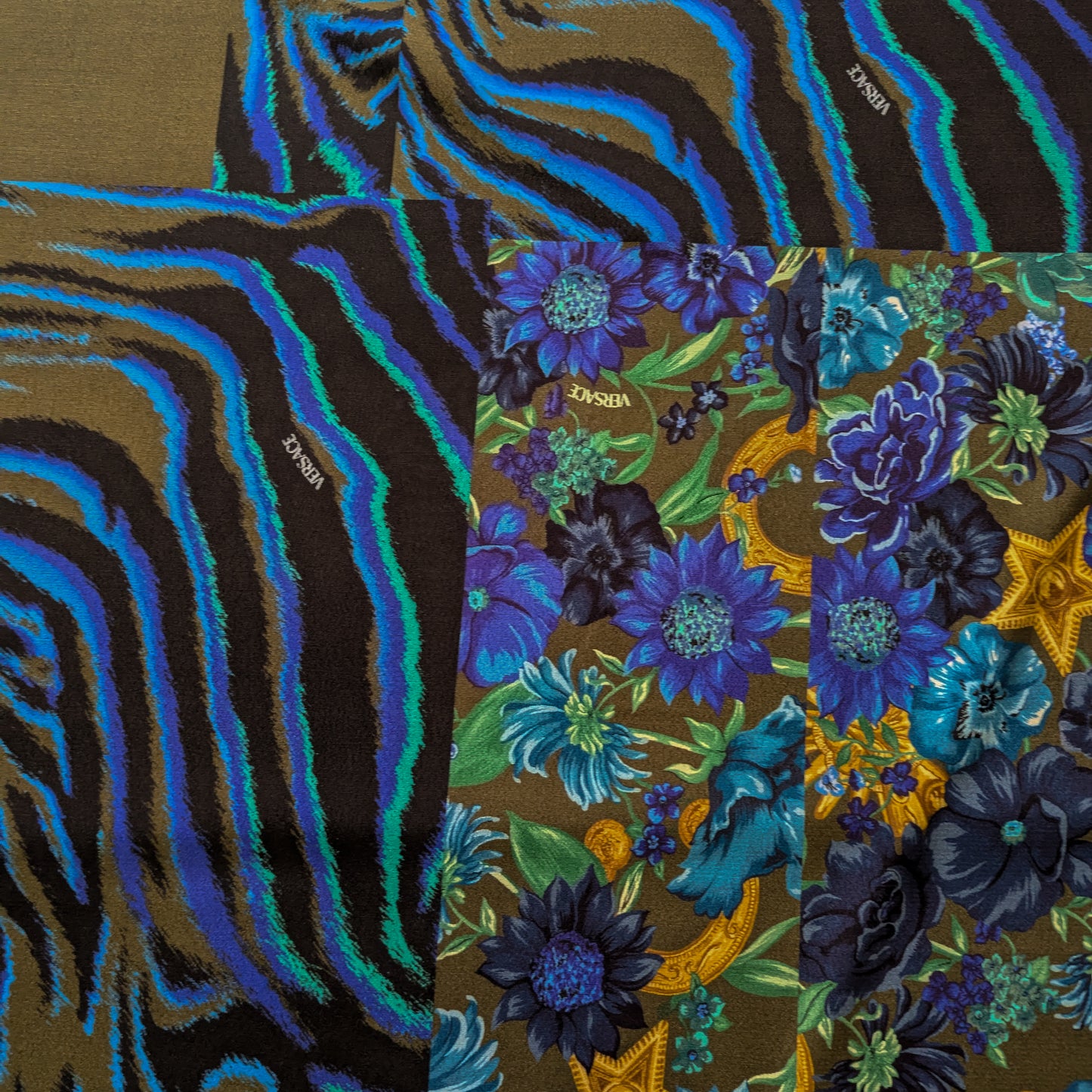 Viskosecrepe panel with blue zebra stripes and floral Versace print on an olive background.