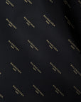 Deadstock Polyesterstoff, B*lenciaga – Schwarz Goldenes Logo B_ware, da schief gedruckt (Breite 150 cm) (M5X2X1)