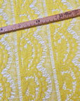 D&G Designerstoff – Deadstock Polyesterspitze Basisfarbe Empire Yellow | Stoffbreite 145 cm | M10X2X33