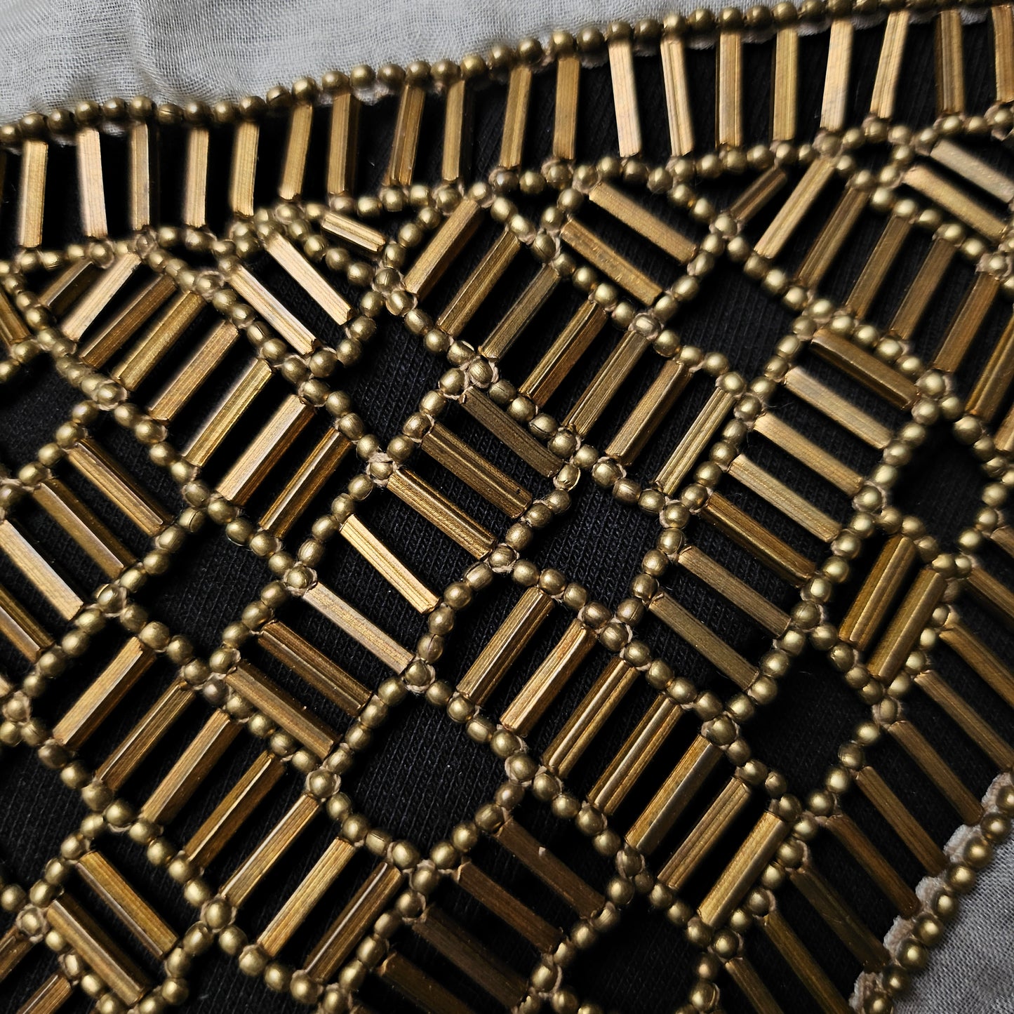 D&G 12x20 cm gold pearl element patch with rectangular and round beads on black fabric.