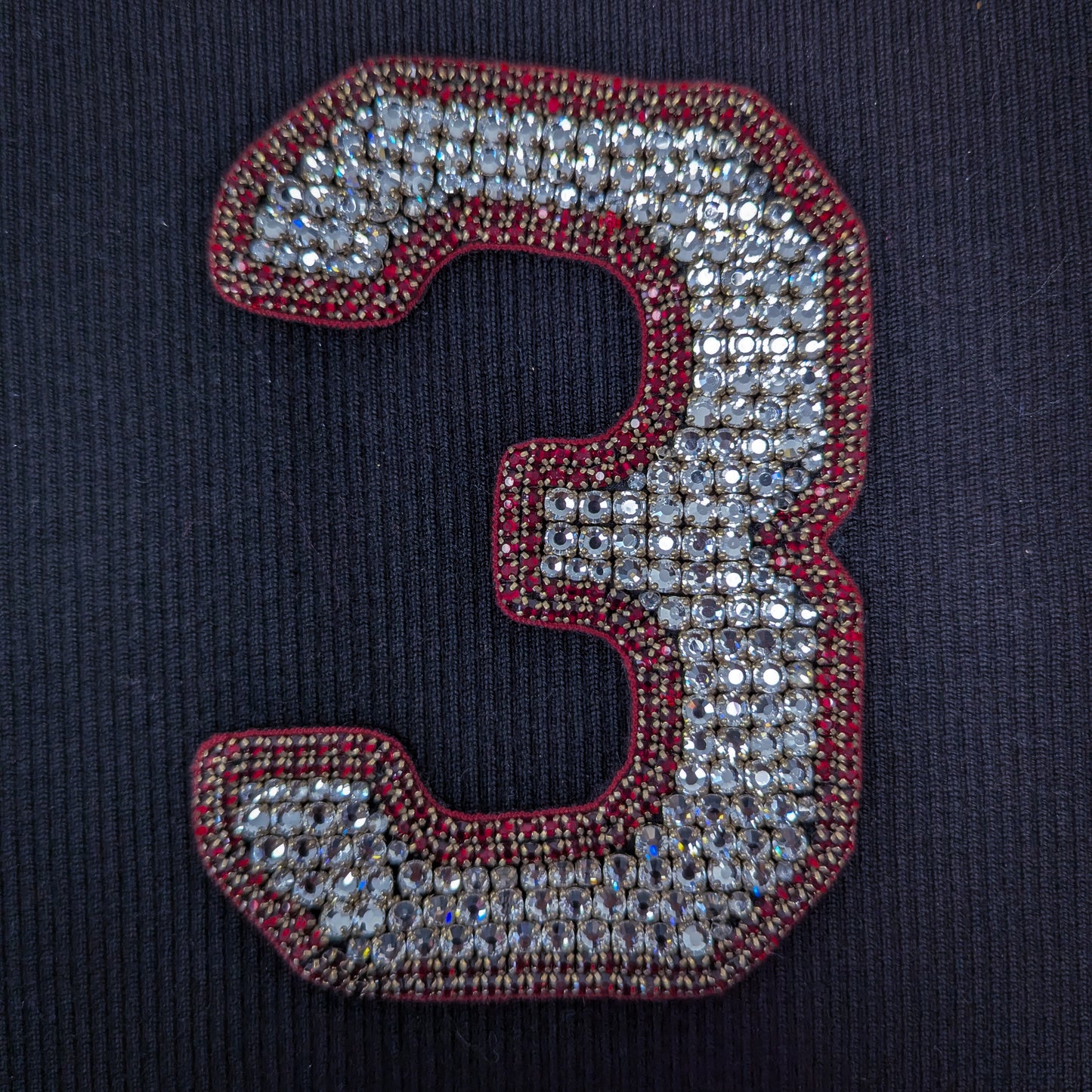 Embroidered D&G number 3 patch, 13cm, adorned with sparkling rhinestones and red beaded trim.