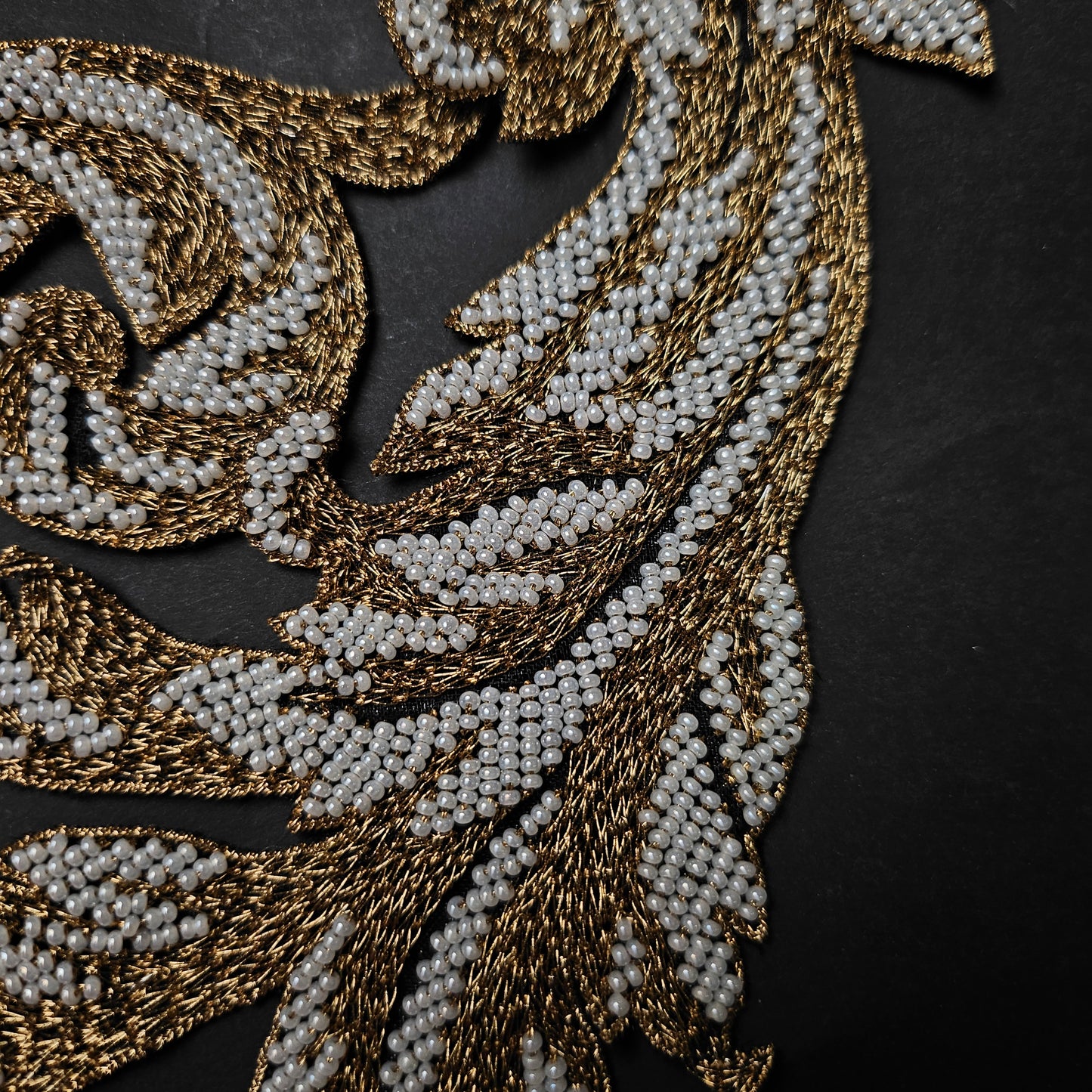 D&G 11x23cm patch with intricate gold metallic embroidery and white pearl beadwork in an ornate design.