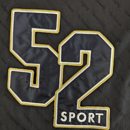 Embroidered D&G patch, black "52 SPORT" design with gold and white outlines, 20x22 cm, mixed fabric.