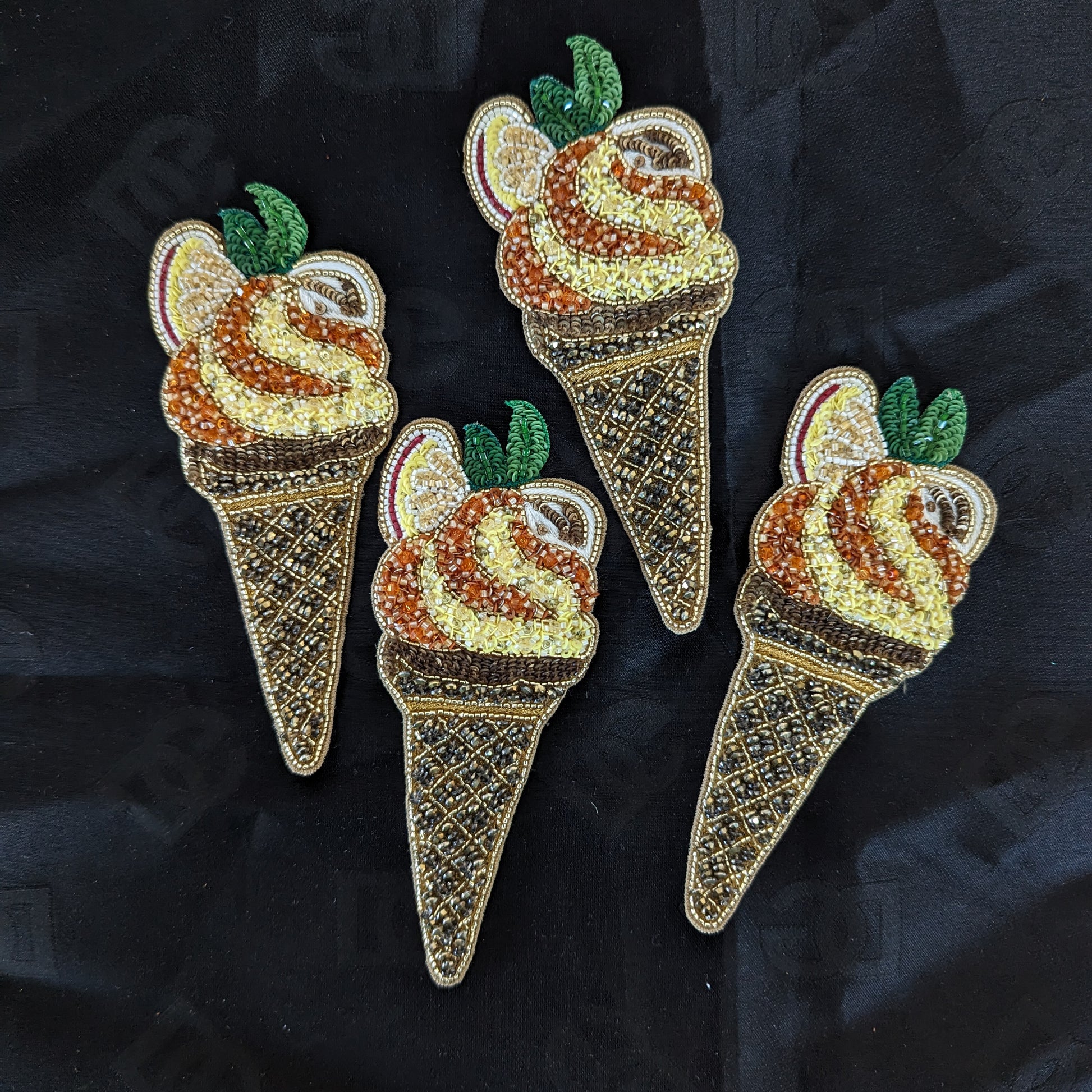 Four beaded ice cream cone patches, 5x12cm, with brown, gold, and yellow pearls, green leaves, and fruit accents.