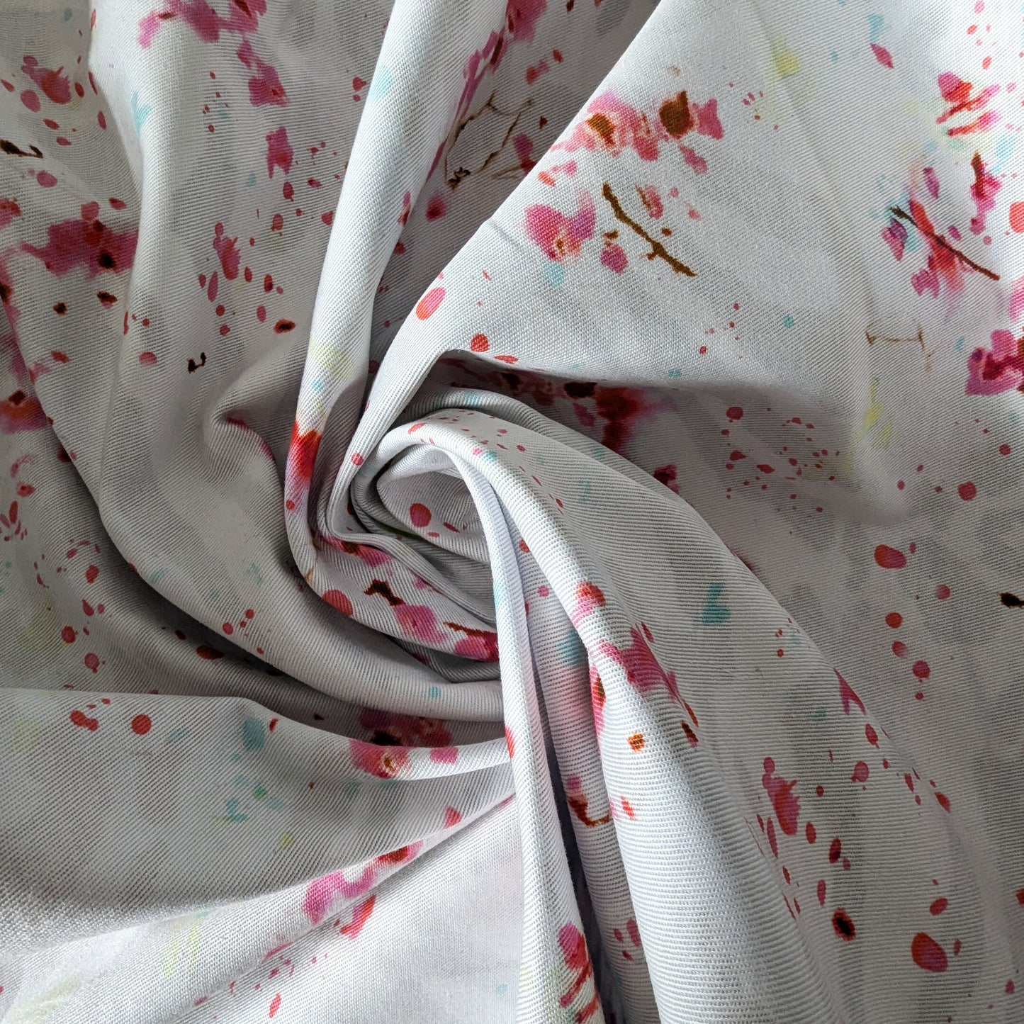 Deadstock Patrizia Pepe double-sided denim with pink floral splatter print, light stretch.