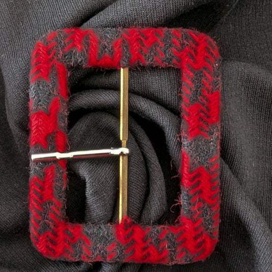 Red and gray chevron textile-covered D&G belt buckle with a gold-tone pin.