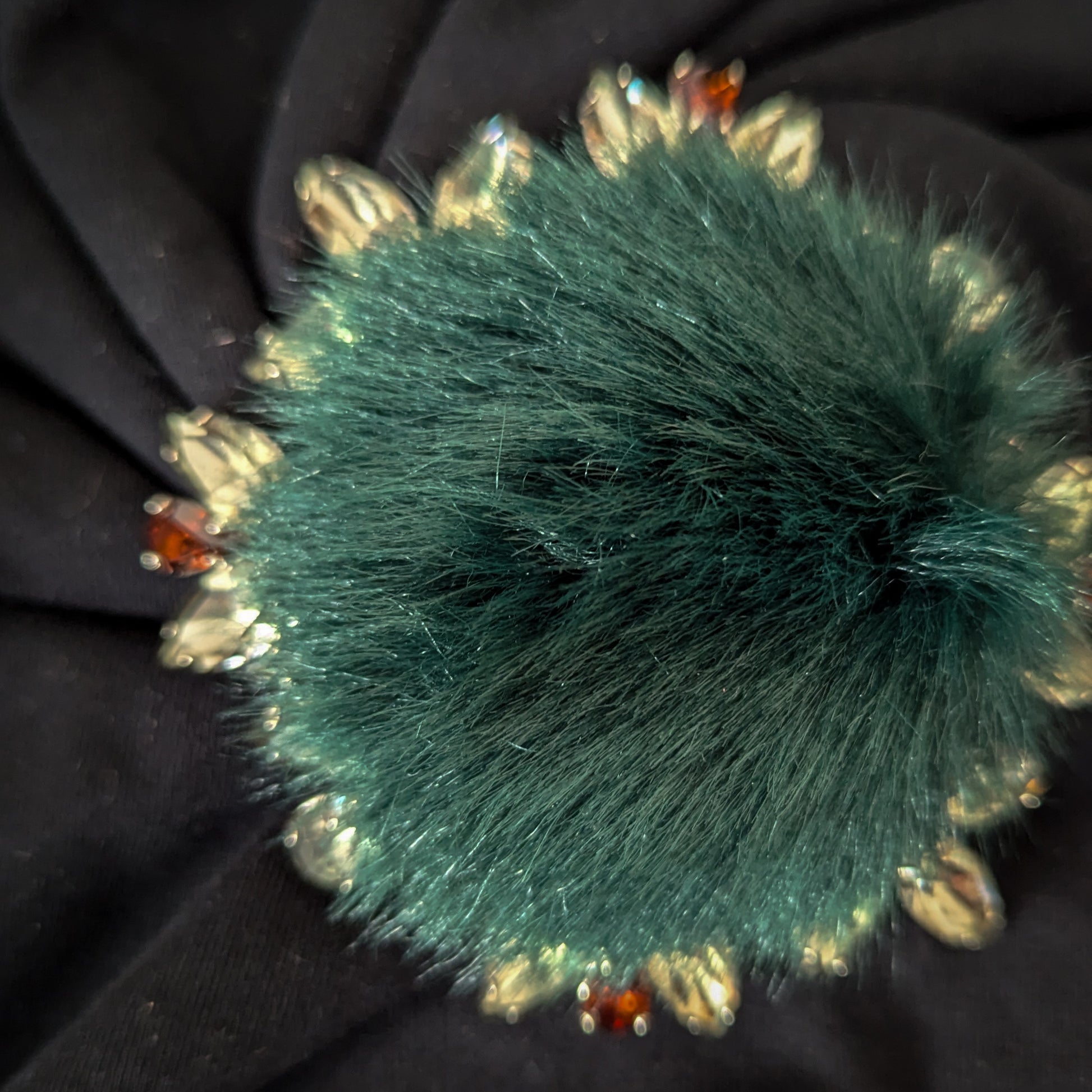 Dark green faux fur ornament with sparkling Swarovski stones, 9cm x 9cm.