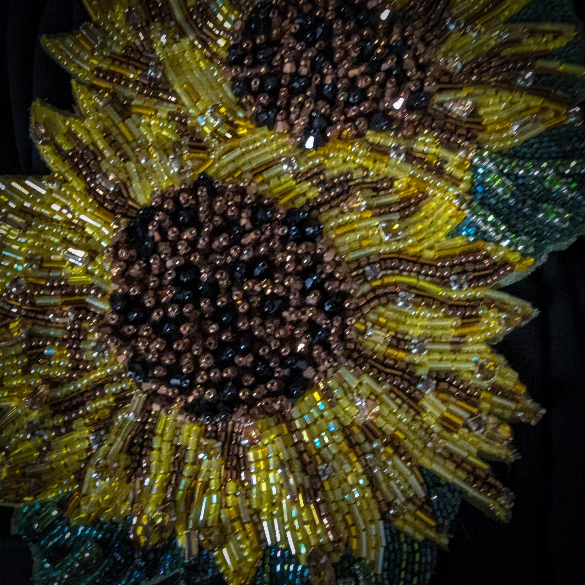 Heavy D&G sunflower patch, 14x18cm, with yellow and brown beads on a black background.