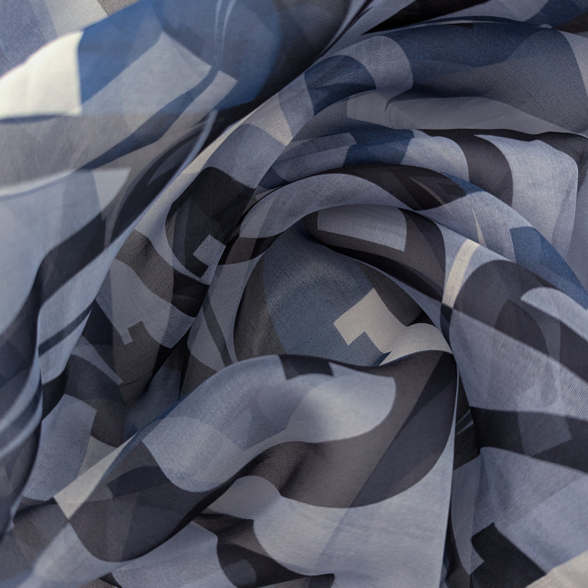 D&G deadstock blue, gray, and white patterned silk chiffon fabric panel.