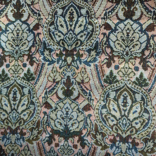 Rich gold cotton-Lurex brocade fabric with intricate, shimmering double-sided floral paisley patterns.