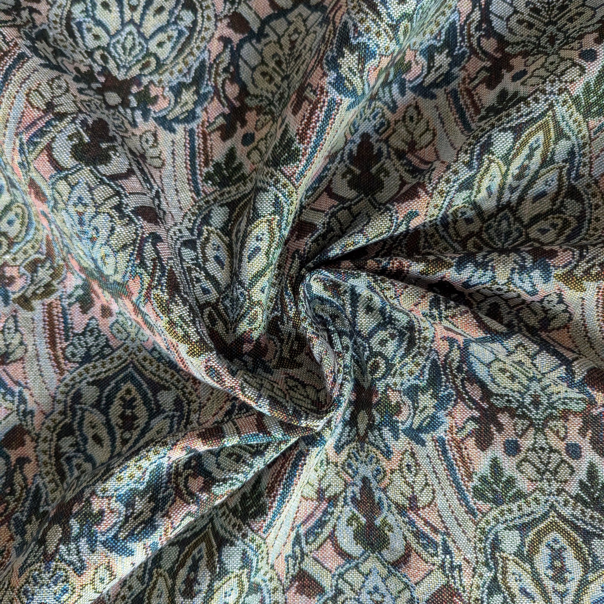 Rich gold cotton-Lurex brocade fabric with intricate, colorful double-sided floral and paisley patterns.