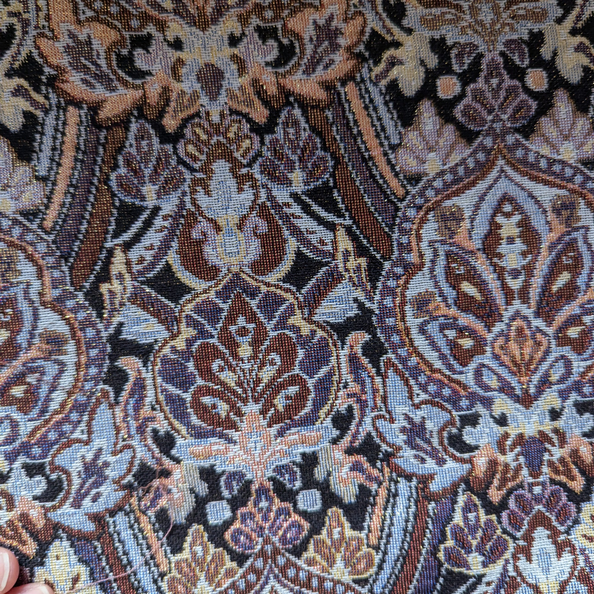 Rich gold, blue, and brown cotton-Lurex brocade fabric with intricate double-sided floral and paisley patterns.