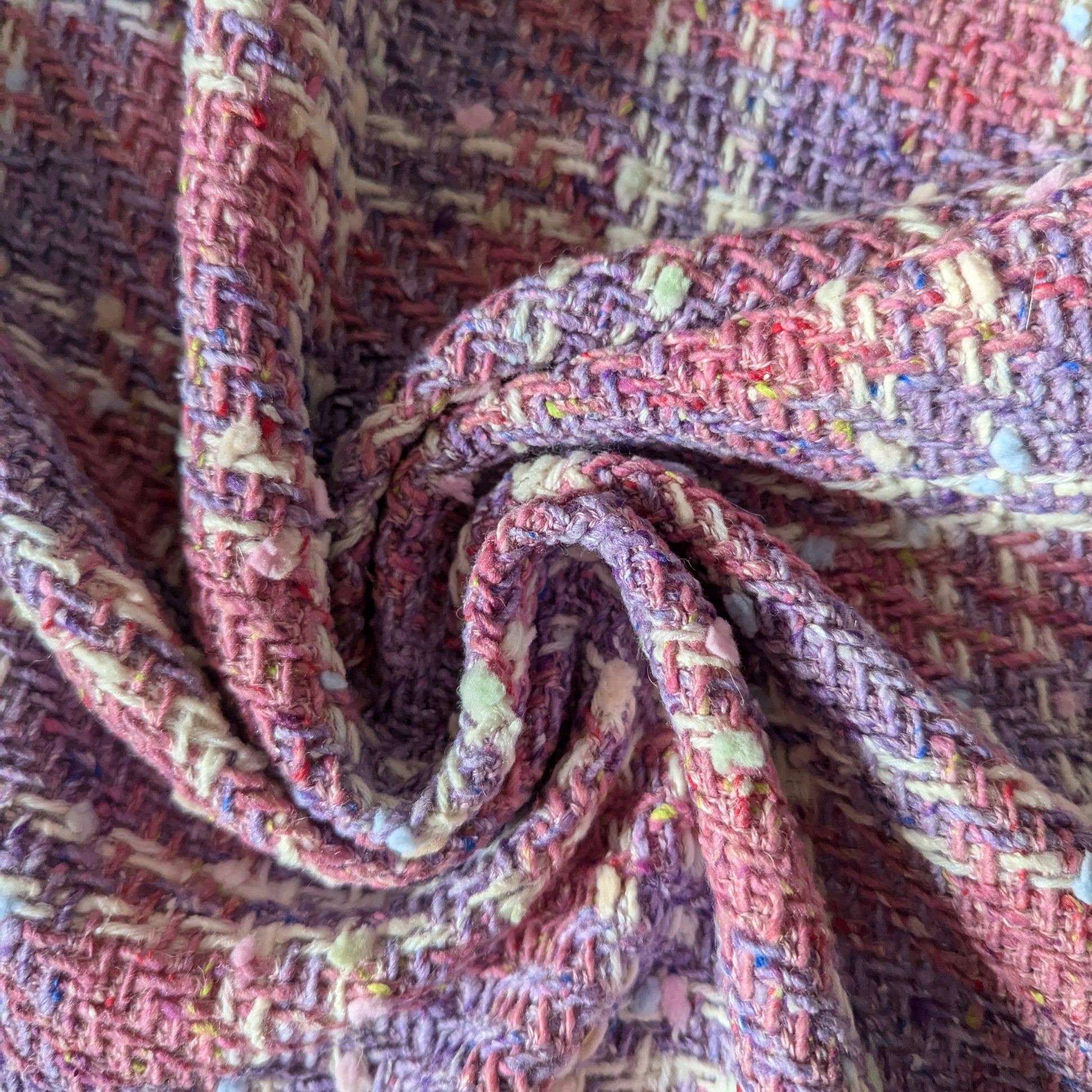 Deadstock tweed fabric in Chateau Rose and Bougainvillea Blush Powder, 140 cm wide, with a textured weave.