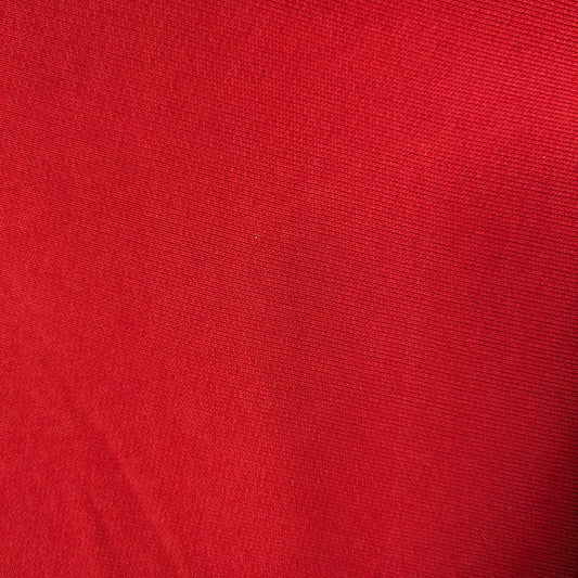 High-quality tomato red C*line deadstock cotton sweatshirt fabric with a subtle sheen.
