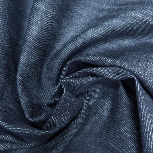 Deadstock dark blue melange stretch denim fabric, 130 cm wide, with a subtle texture.