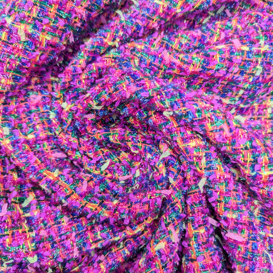 Rose violet neon multicolor bouclé tweed fabric, 150 cm wide, with a textured weave.