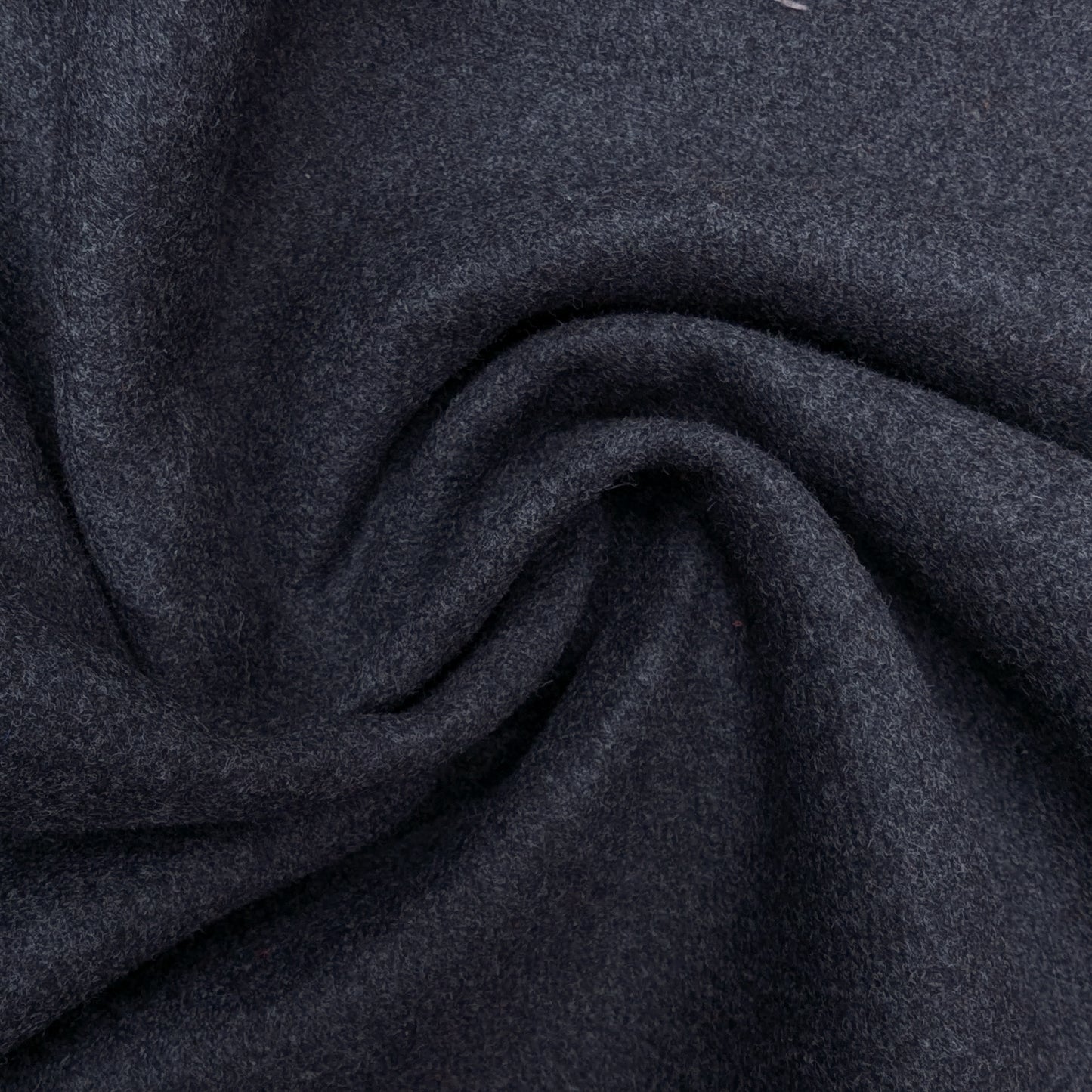 Deadstock dark gray wool-rabbit doubleface fabric, 135 cm wide, with a soft, textured surface.