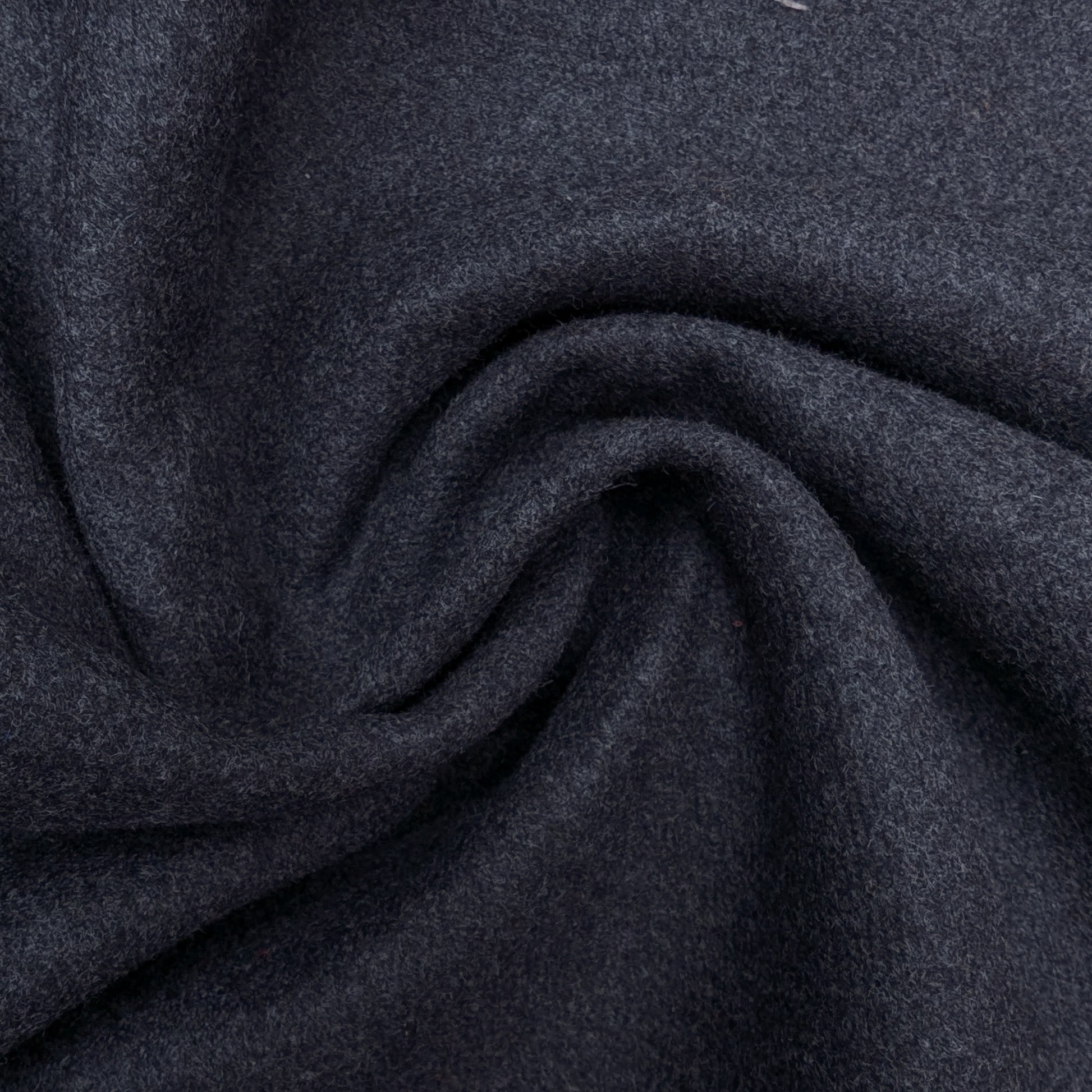 Deadstock dark gray wool-rabbit doubleface fabric, 135 cm wide, with a soft, textured surface.