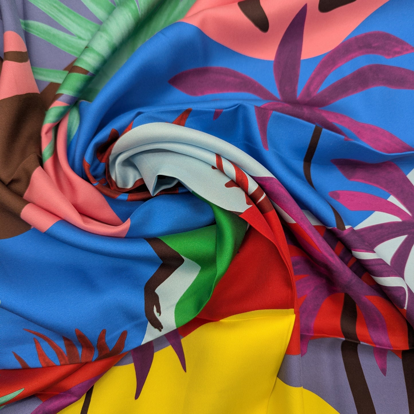Vibrant Ungaro 90x90cm silk scarf with a colorful tropical palm leaf and abstract design.