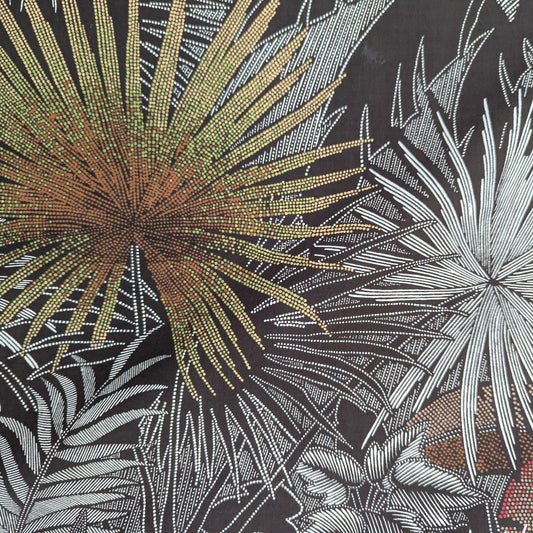 Dark brown synthetic fabric with a vibrant, dotted palm leaf pattern in green, brown, and white.