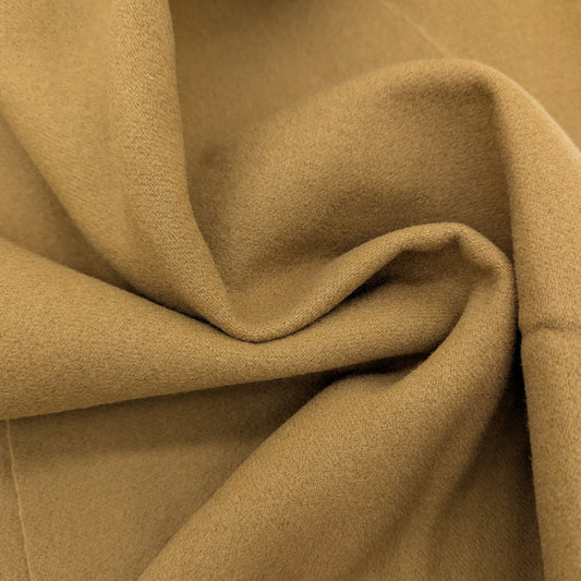 Deadstock C*line wool fabric in dark olive, 145 cm wide, with soft folds.