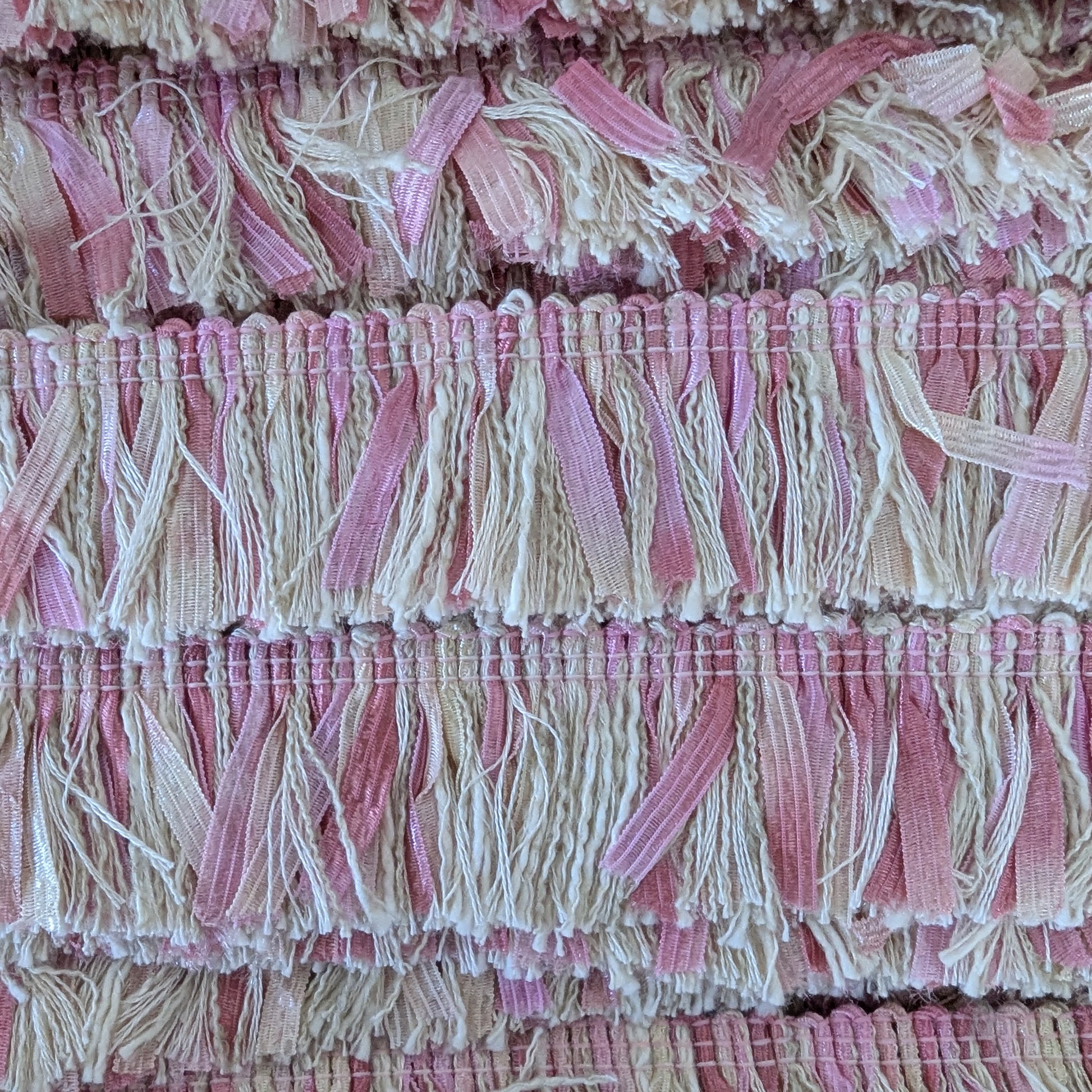 Pink and cream textured tweed trim with fringe, 100 cm long.