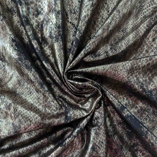 Gold and black snakeskin embossed leather, 300 cm single piece, with a metallic sheen.
