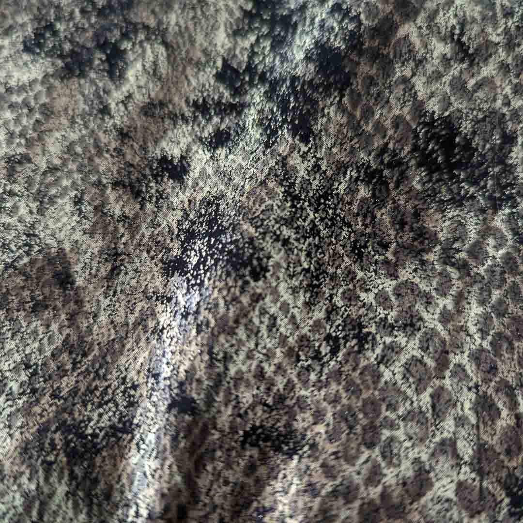 Gold snakeskin embossed leather, 300 cm single piece, for clothing.