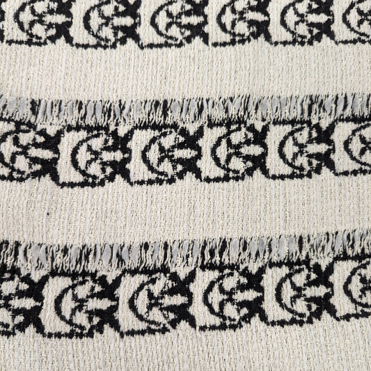 Pinko deadstock cotton tweed fabric, 150cm wide, with black Love Birds pattern on Coconut Milk white.