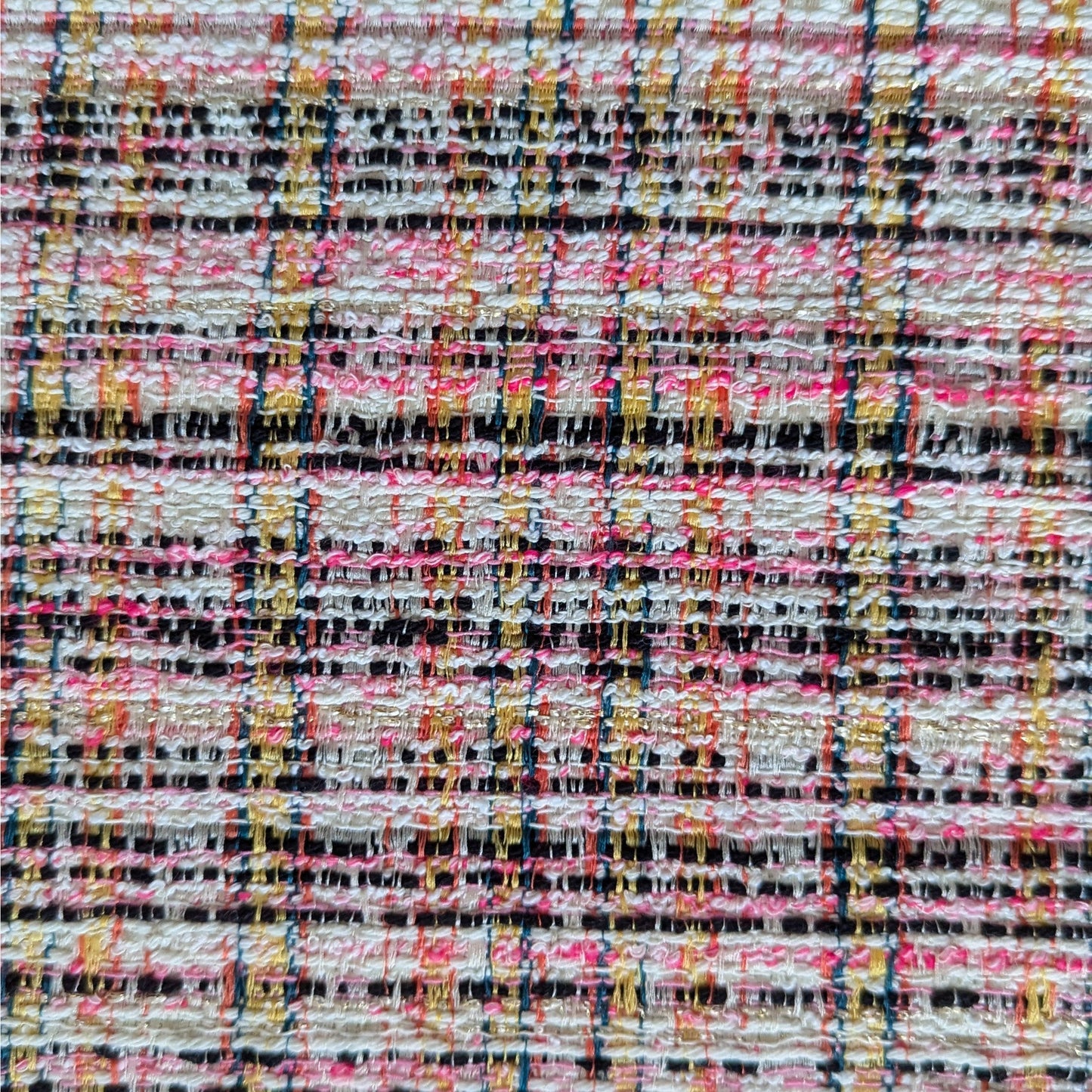 Deadstock tweed cotton blend fabric in Whisper White, pink, neon yellow, black, and Lurex plaid.
