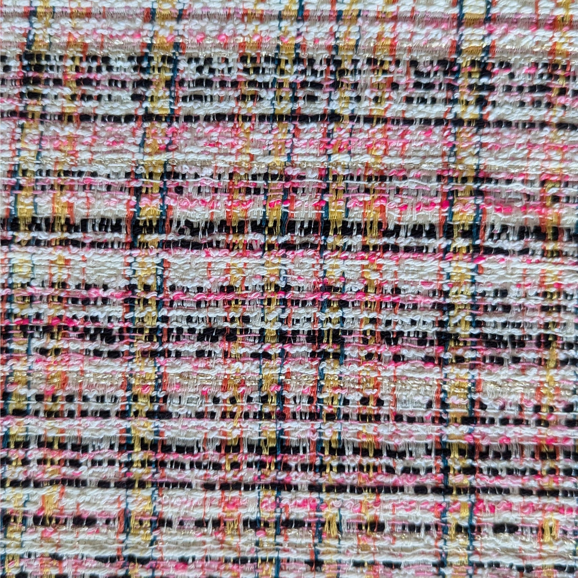 Deadstock tweed cotton blend fabric in Whisper White, pink, neon yellow, black, and Lurex plaid.