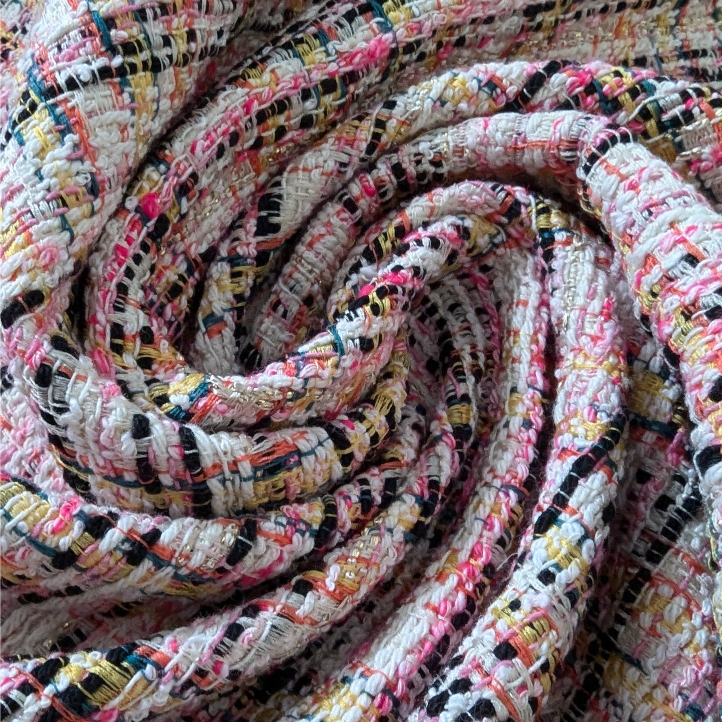 Deadstock tweed cotton blend fabric, Pantone Whisper White with pink, neon yellow, black, and gold Lurex.