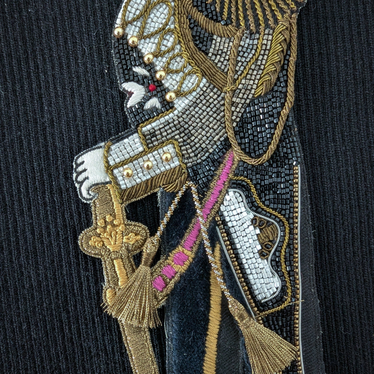 D&G embroidered patch: detailed black, gold, white, and pink uniform design with beads and tassels, 30 cm.