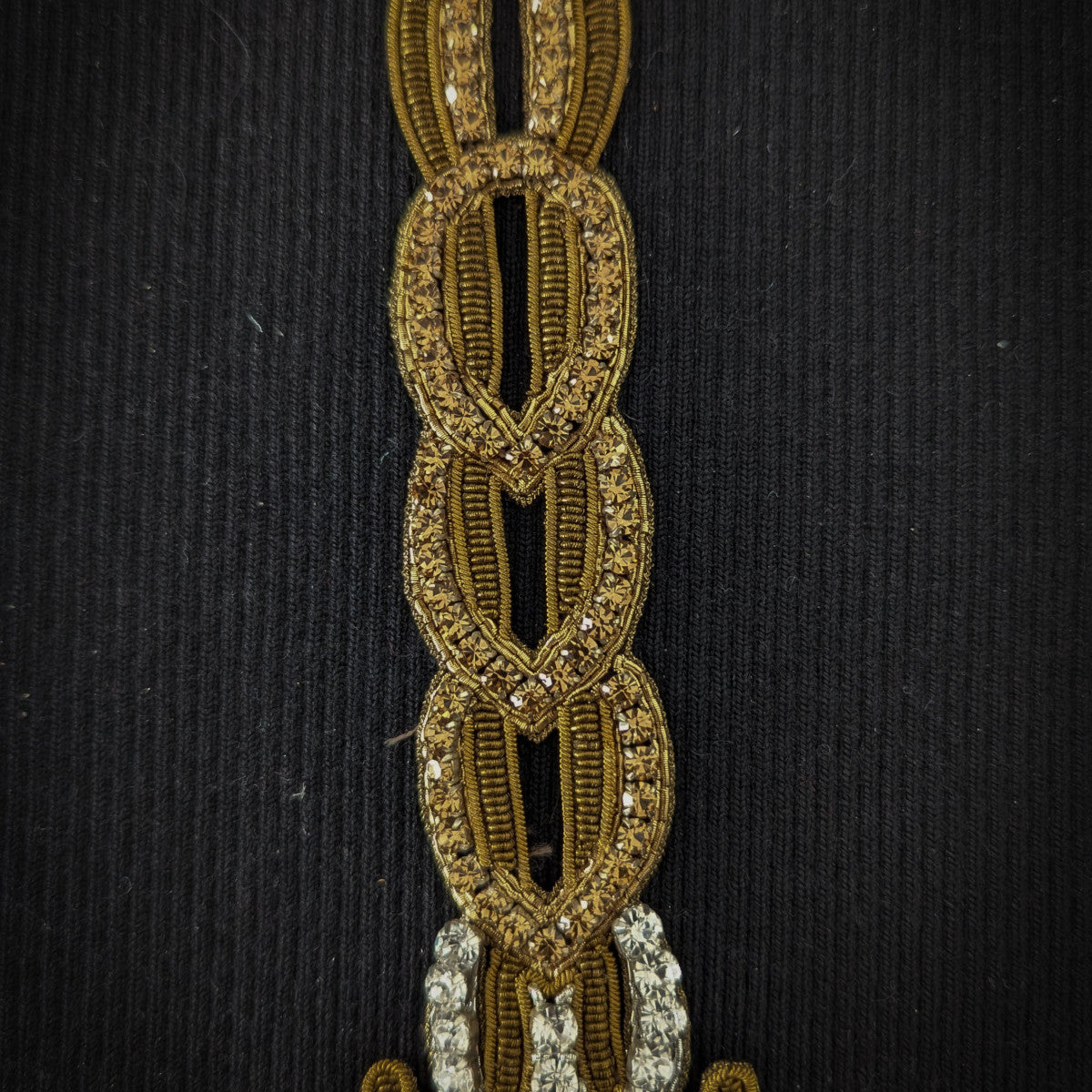 D&G 18cm gold and silver metallic embroidered patch with stones on black fabric.