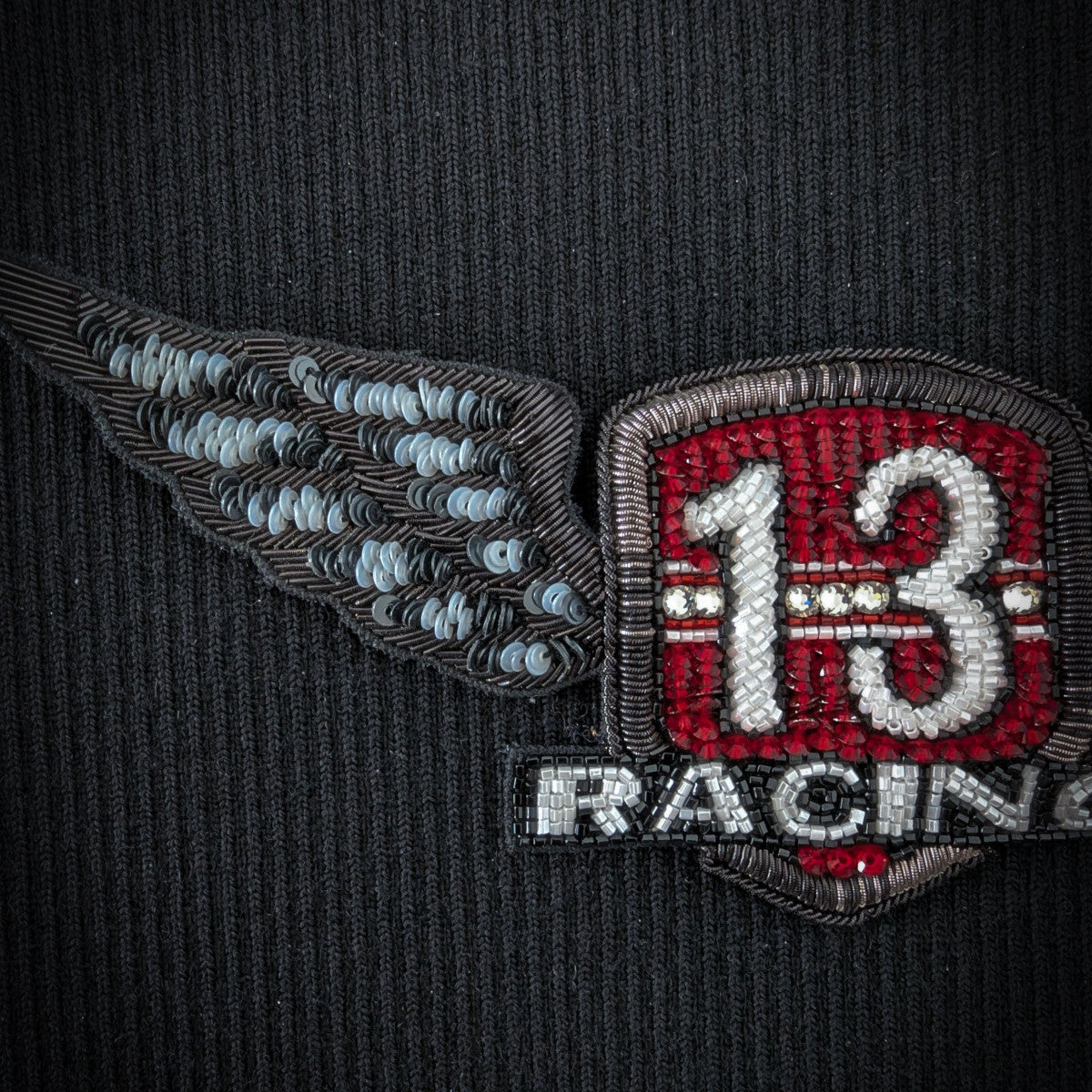 D&G "13 Racing" patch, 16cm, with red and white beads, silver sequins, and wing design on black fabric.