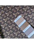 B*rberry Designerstoff – Deadstock Lycra Monogram-Design Cocoa Mocha | 145 cm | M2X1X10