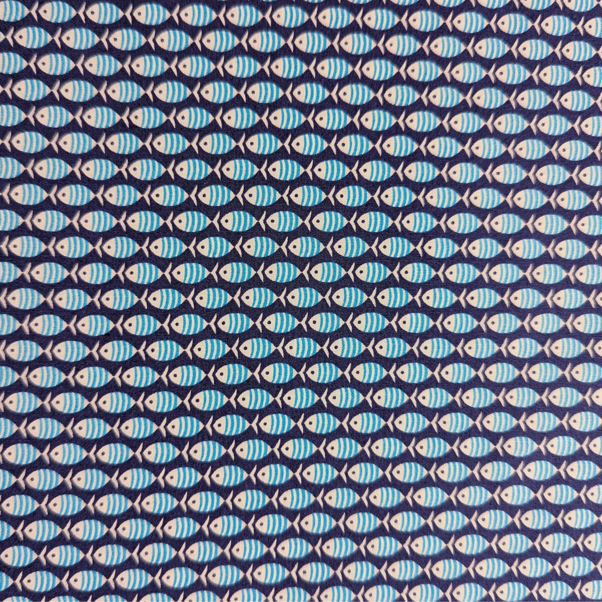 Dark blue cotton poplin fabric with a repeating pattern of light blue striped fish.
