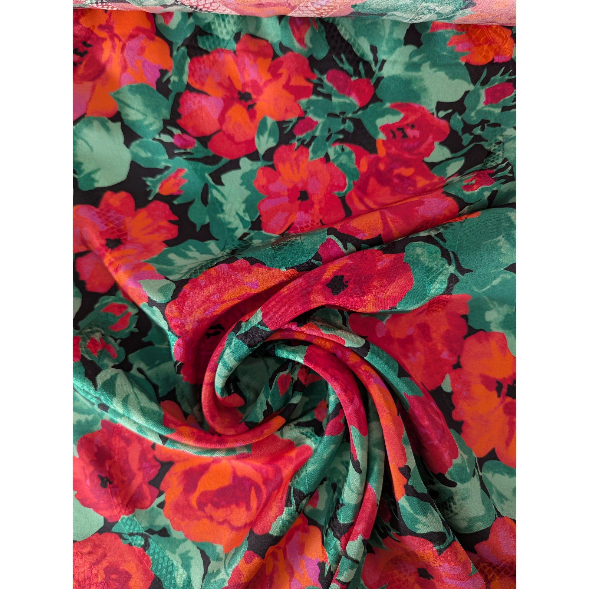 Luxurious Deadstock G*cci jacquard silk fabric with vibrant red floral and green leaf pattern.