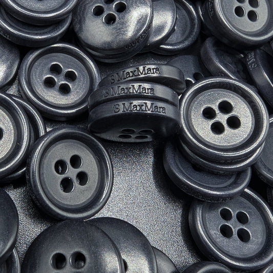 Dark grey 1.4cm Max Mara 4-hole buttons, smooth and polished, for coats or cardigans.