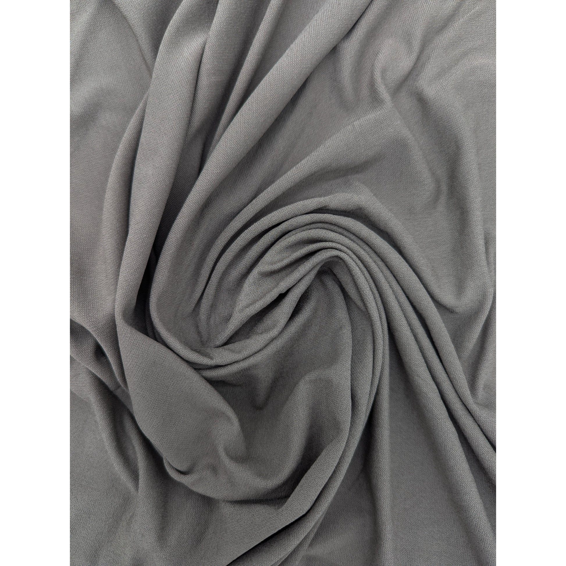 Elegant mud grey Mich*l K*rs deadstock viscose jersey crepe fabric with flowing drape and fine texture.