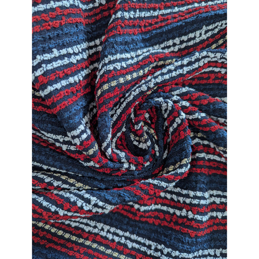 Deadstock Gucci wool tweed fabric, dark blue with red, white, and gold striped lurex shimmer.