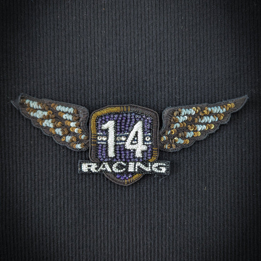 D&G Perlen Racing patch, 16cm, with "14" and "RACING" in purple beads, flanked by beaded wings.